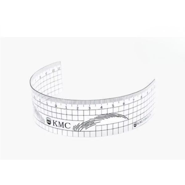 plastikowa, bezbarwna linijka do&nbsp;symetrii łuków brwiowych wielokrotnego użytku